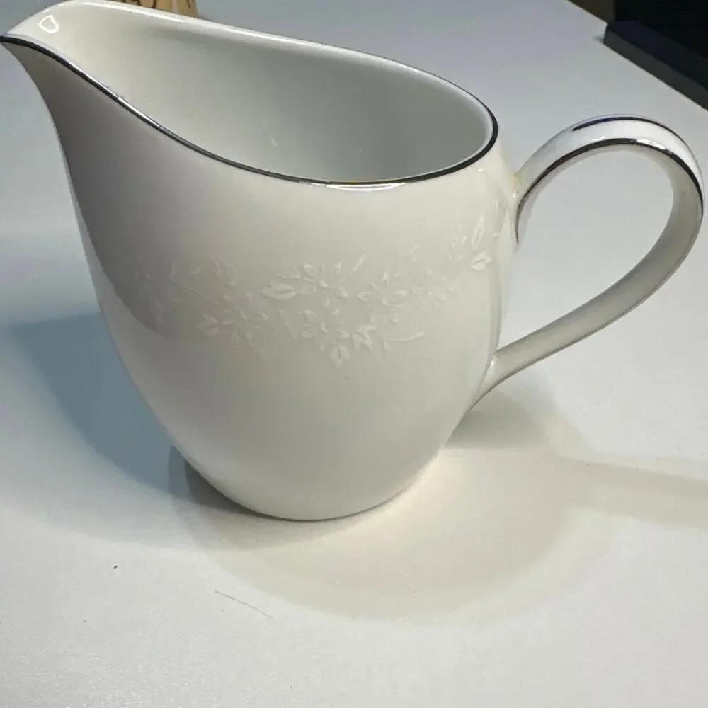 Replacement piece-Creamer  Enchantment Silver trim white flower print  10 oz